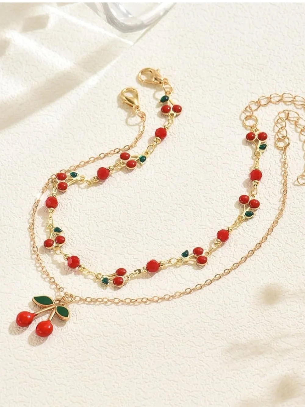 Anthropologie Gold-Tone Cherry Bracelet Set with Red and Green Accents